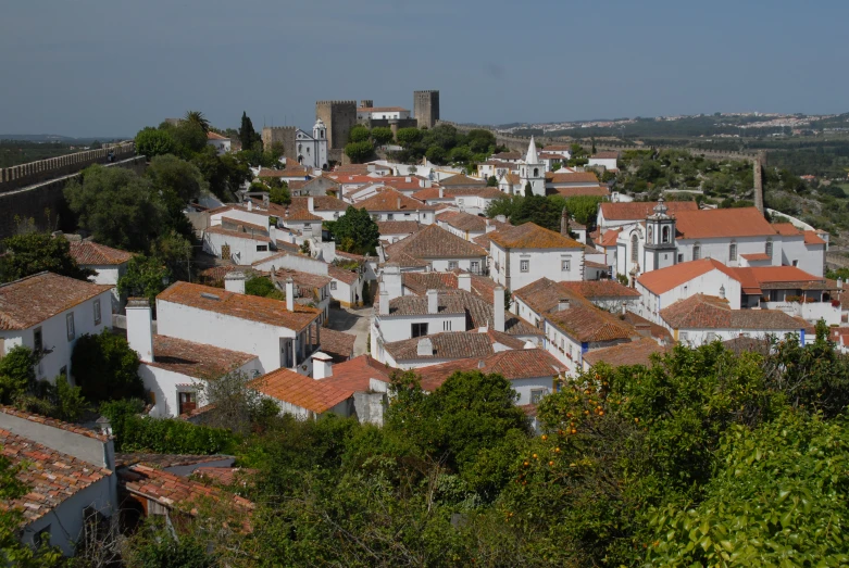 a small town on the hill in portugal