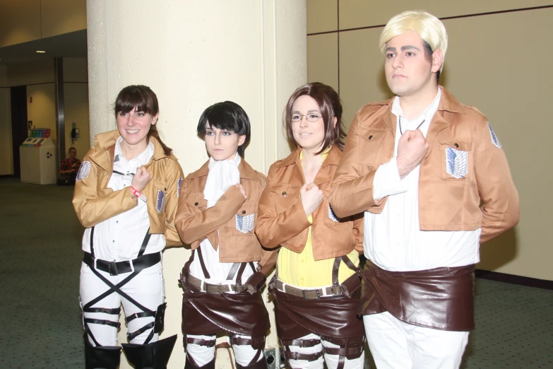 several people in costume posing for a picture