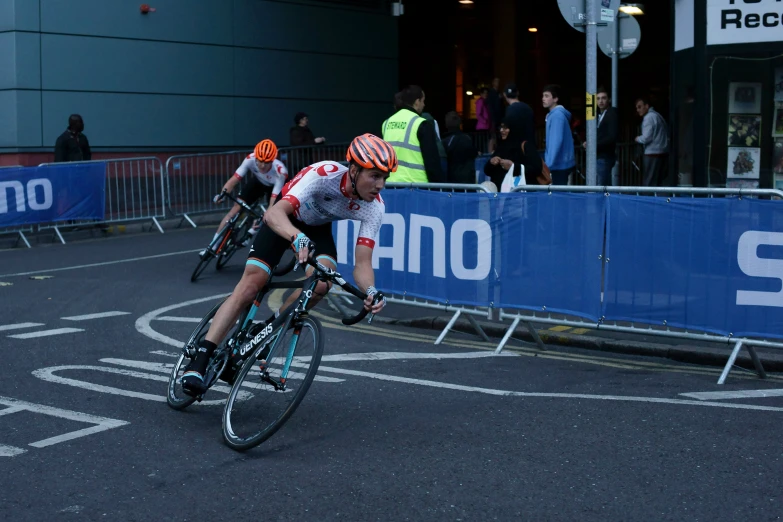 people on bicycles competing in a bike race