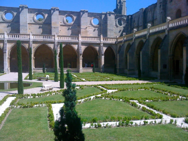 the courtyard is very old with many plants