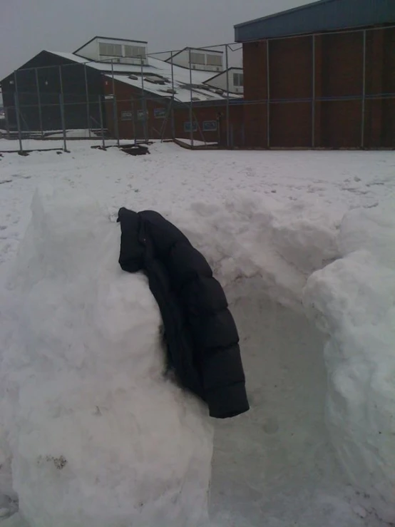 a pair of boots that have been set in snow