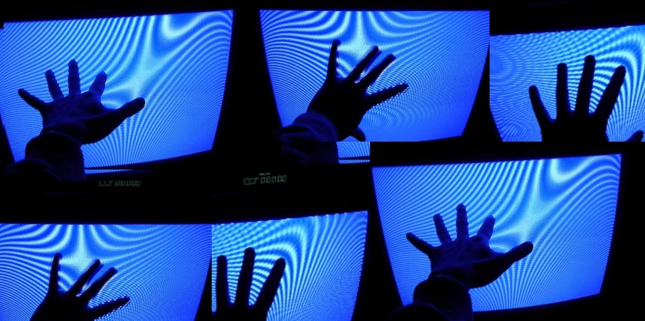 a blue television screen with six tvs showing blue hand prints