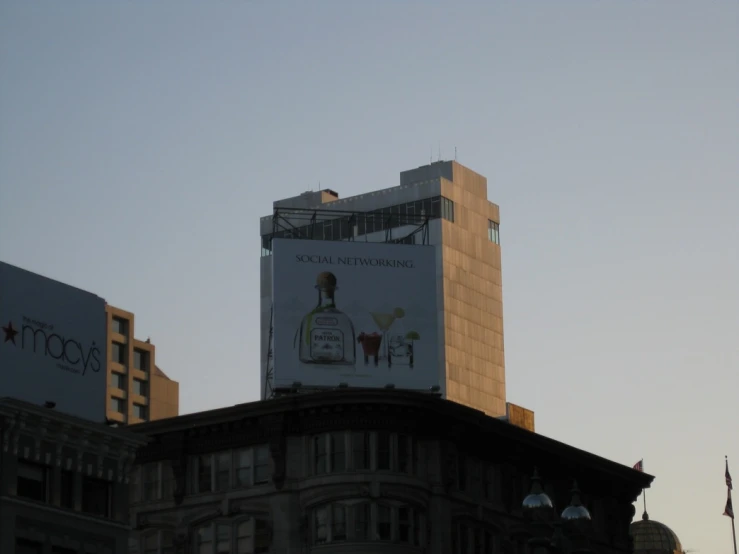 a billboard on top of a large building