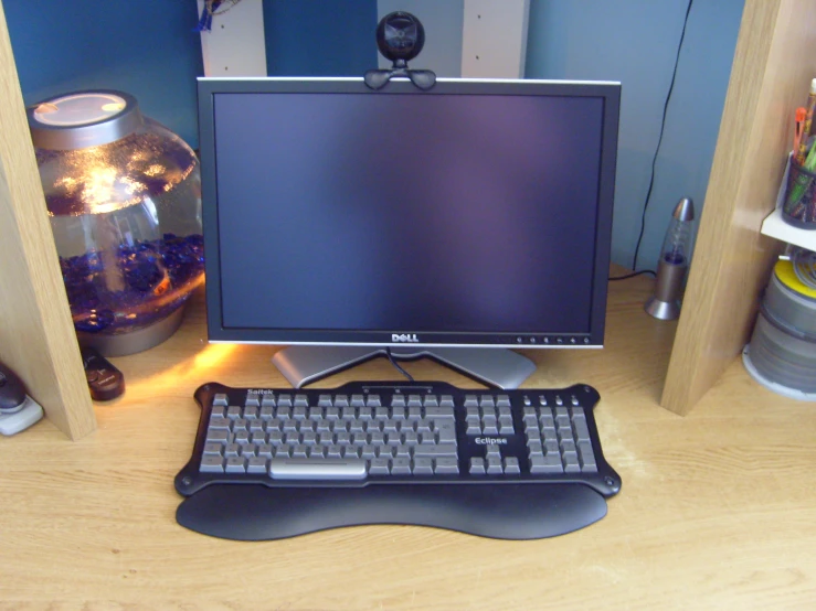 a desk top computer sitting on top of a desk