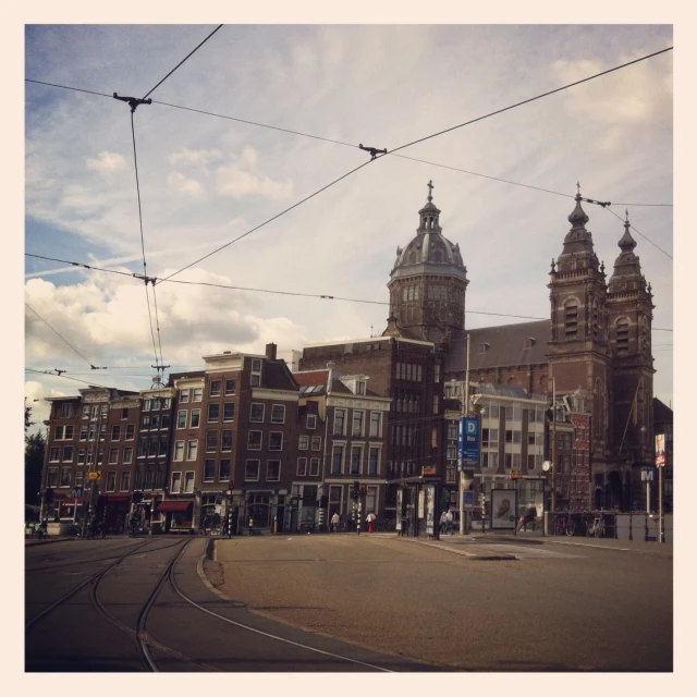 a group of buildings with a sky background