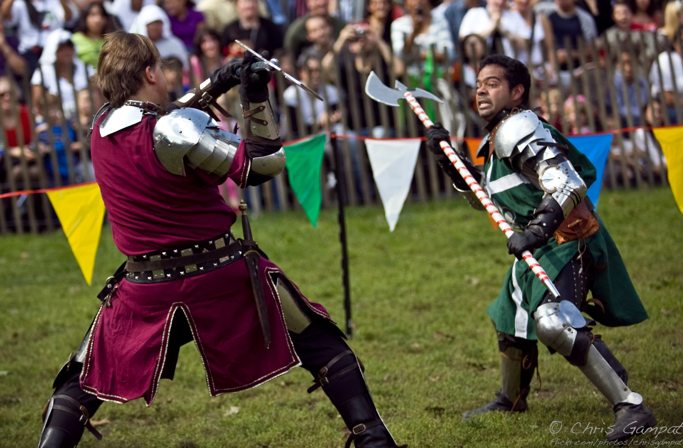 two men in costume compete against each other in battle