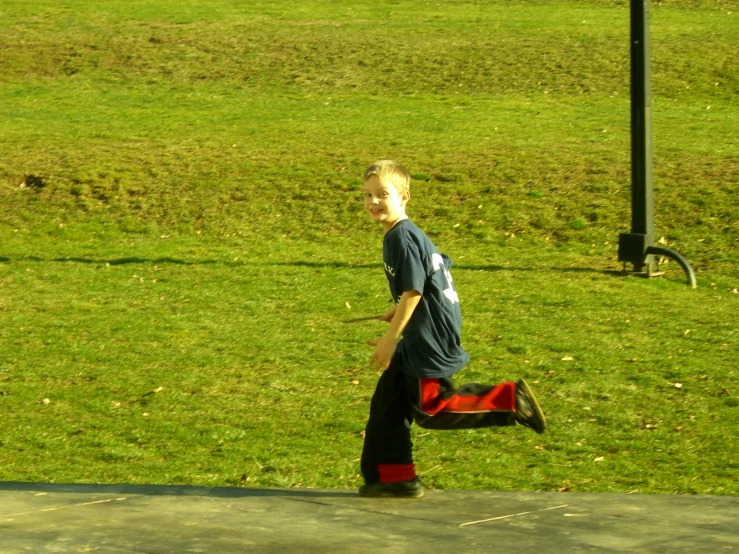  playing with a ball in grassy area