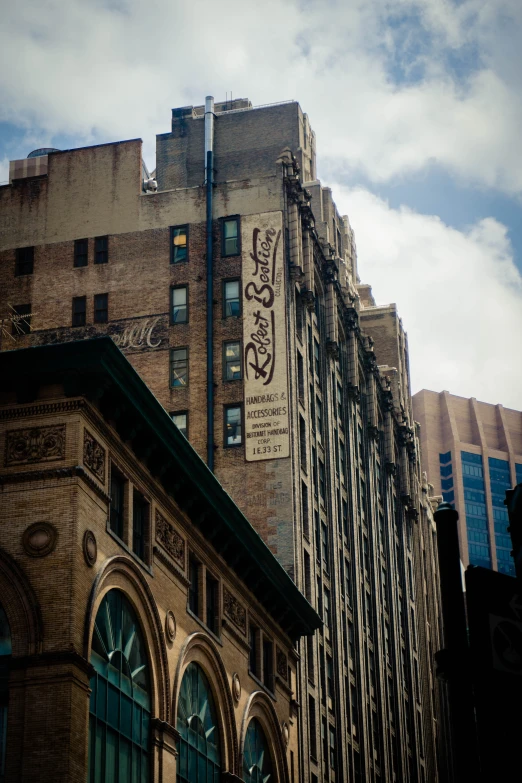 the tall building in front of the sky