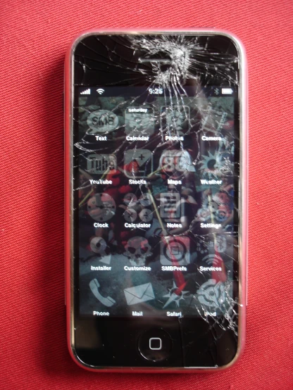an iphone with a broken screen, with pos in it