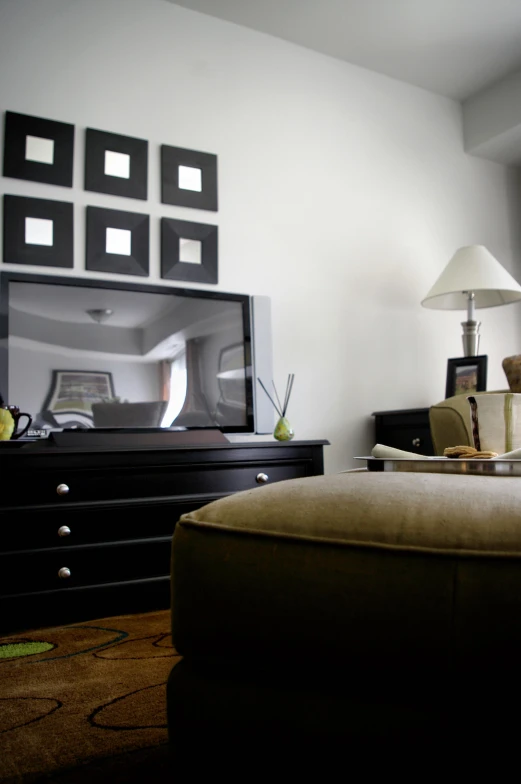 a large tv is shown in a living room