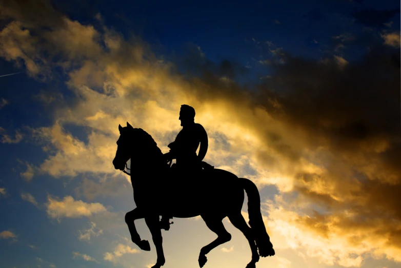 a man that is on top of a horse