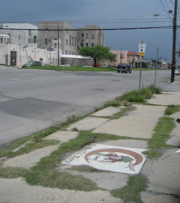 the parking lot for a city street has graffiti on it