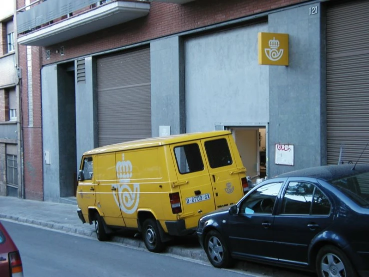 an electric bus parked on the side of a street