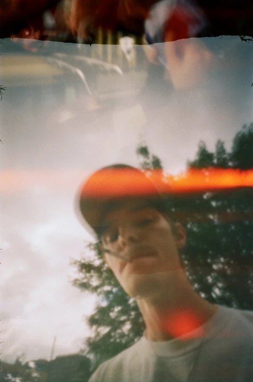 a man is seen through a double exposure window