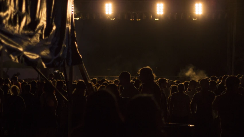 there is a stage with some lights and the crowd