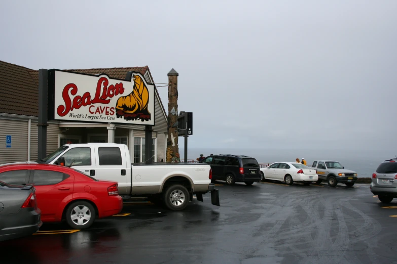 a parking lot filled with lots of vehicles