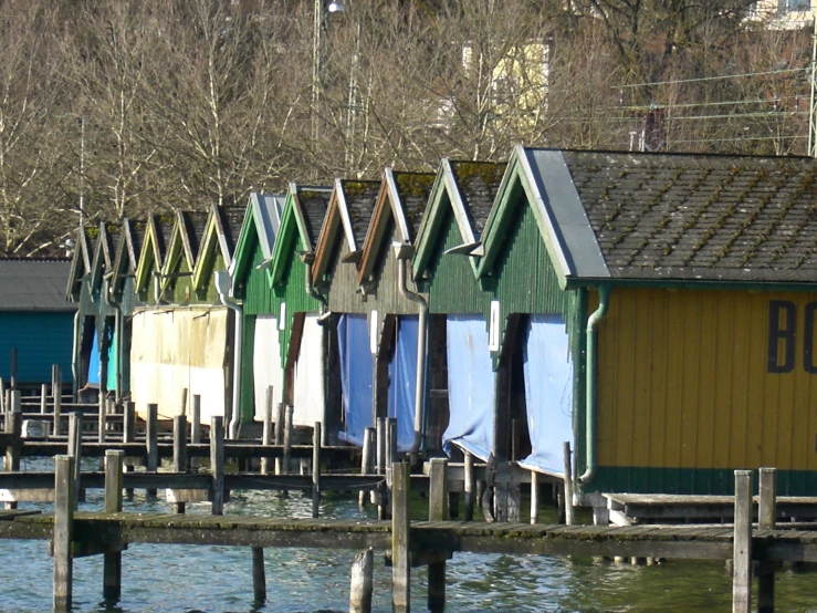 the row of houses in water next to dock