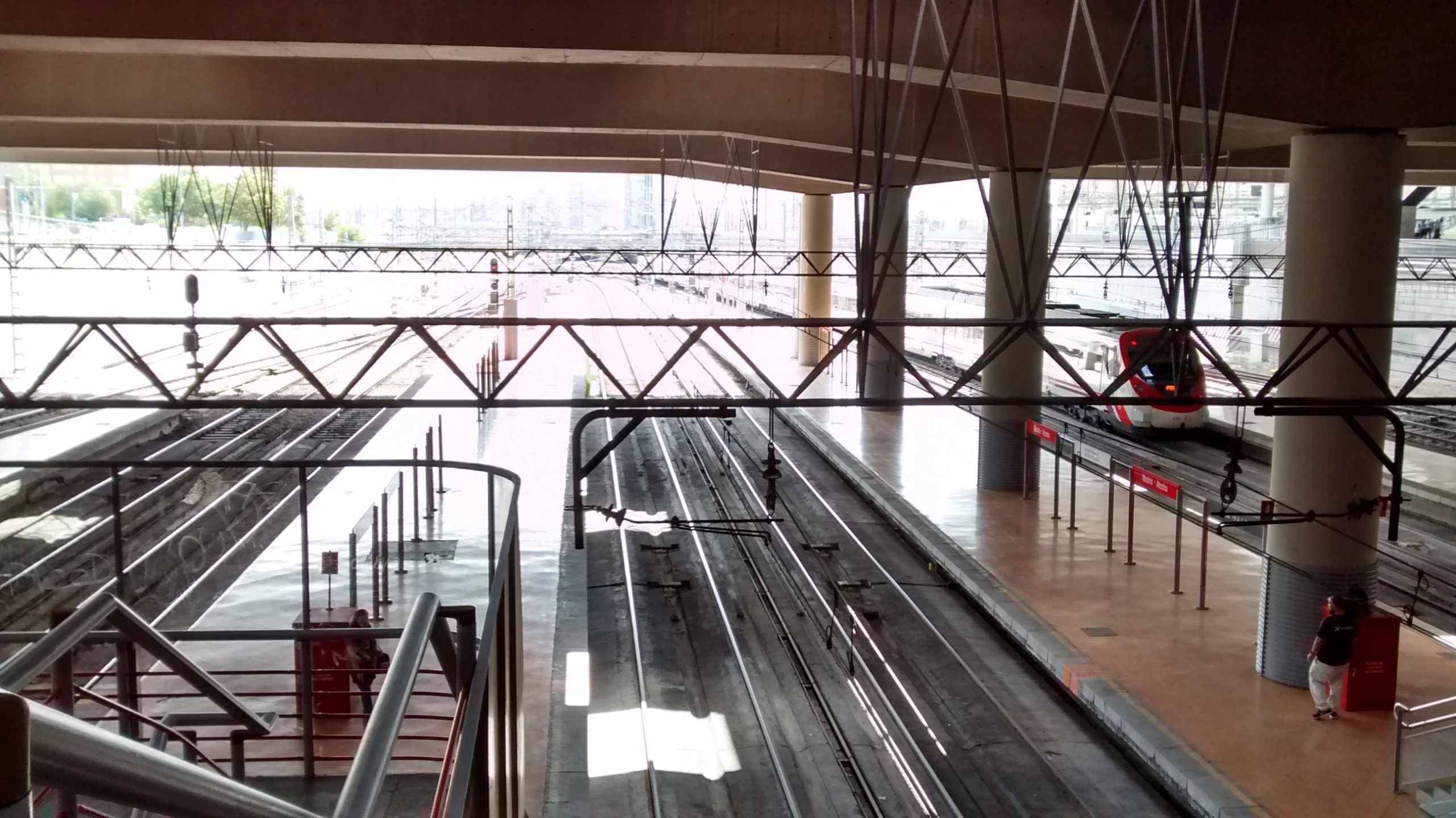 an empty train station with empty platforms