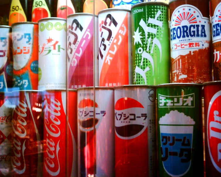 a display in a store filled with soda cans