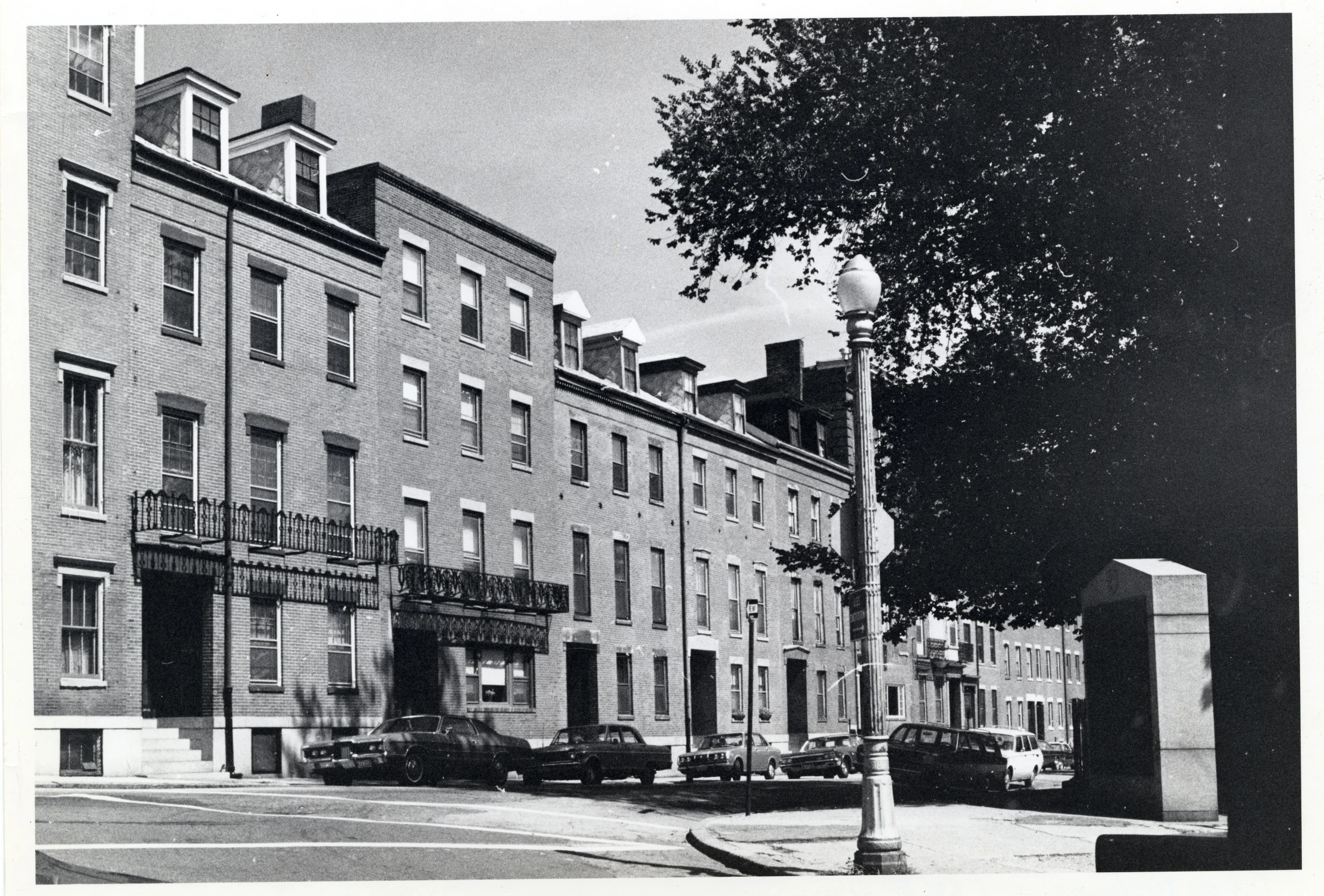 a black and white po of a row of town houses