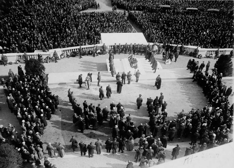 many people are standing together in a circle