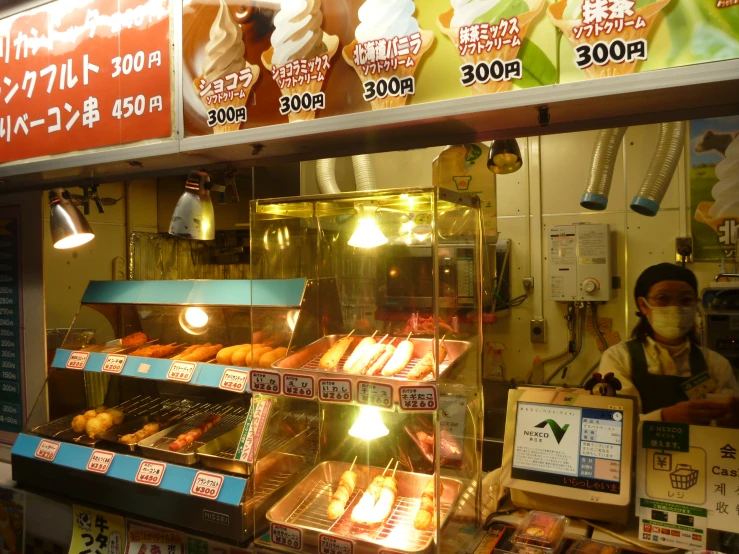 the donuts are in the glass case at the store