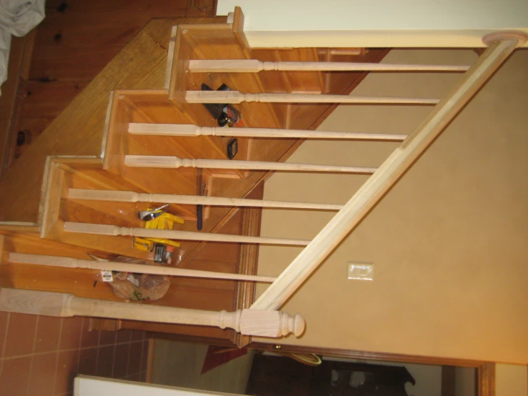 wooden stairs in a house with a window