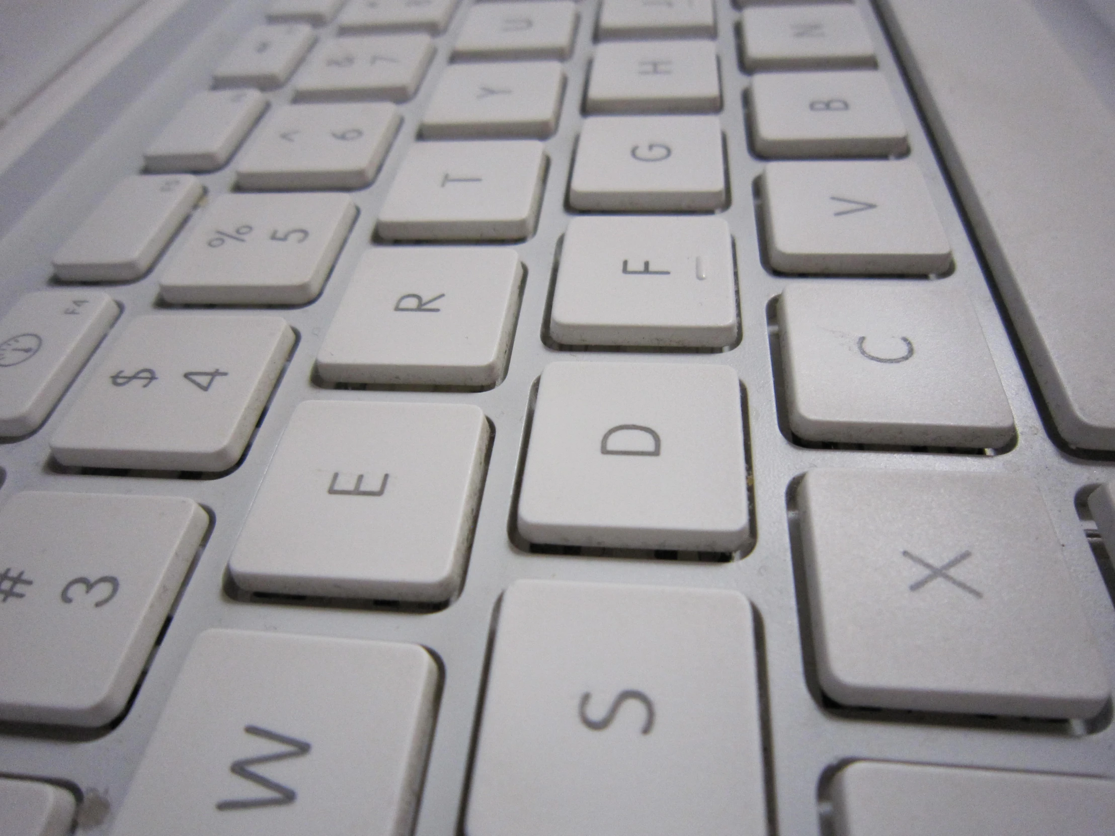 a close - up of a keyboard that is white