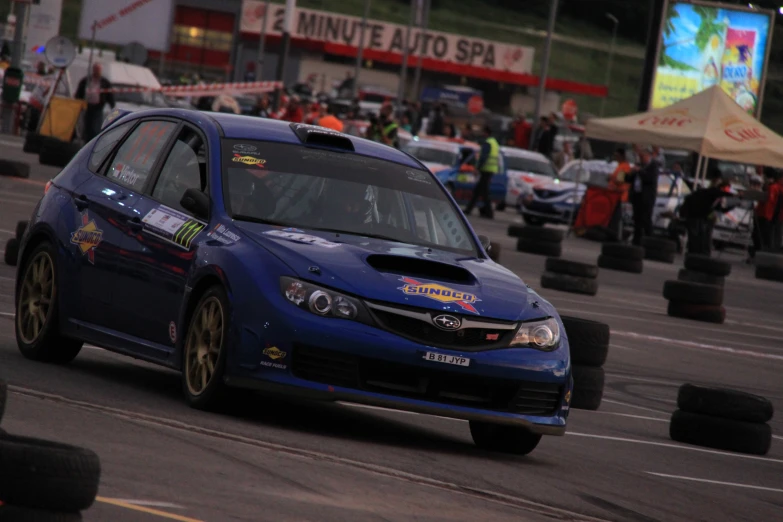 a car driving on a track with wheels