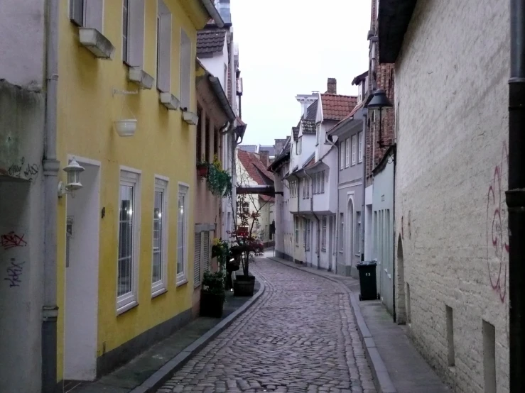 a view of an empty street in an urban area