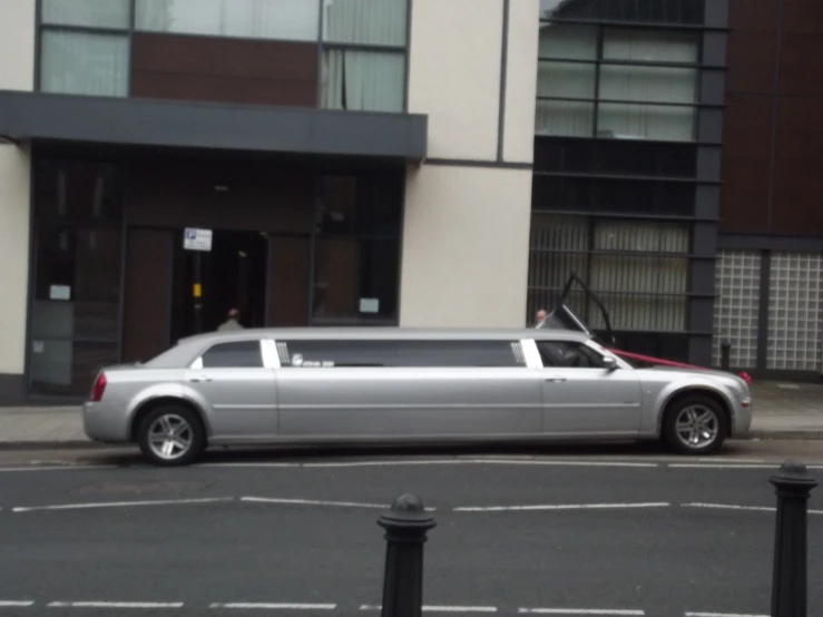 a limousine parked on the side of the road