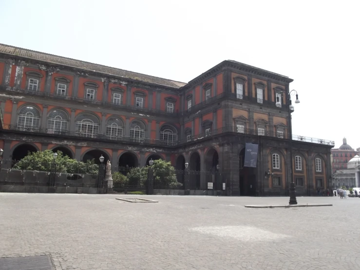 a building with an orange and brown color