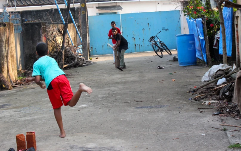 people are playing with an object in the street