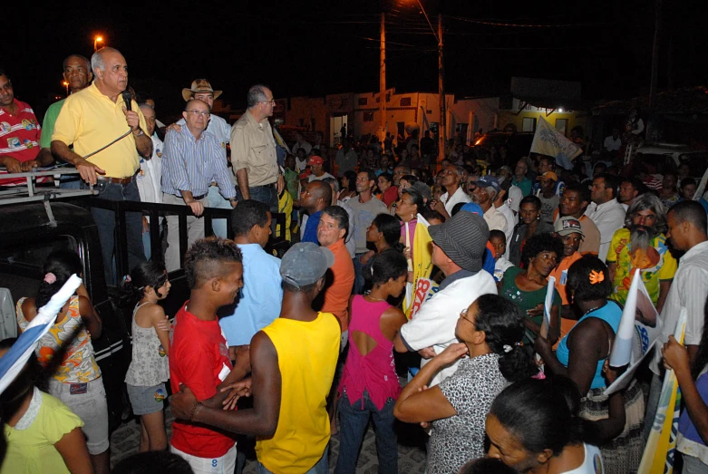 people watching an artist perform at a concert