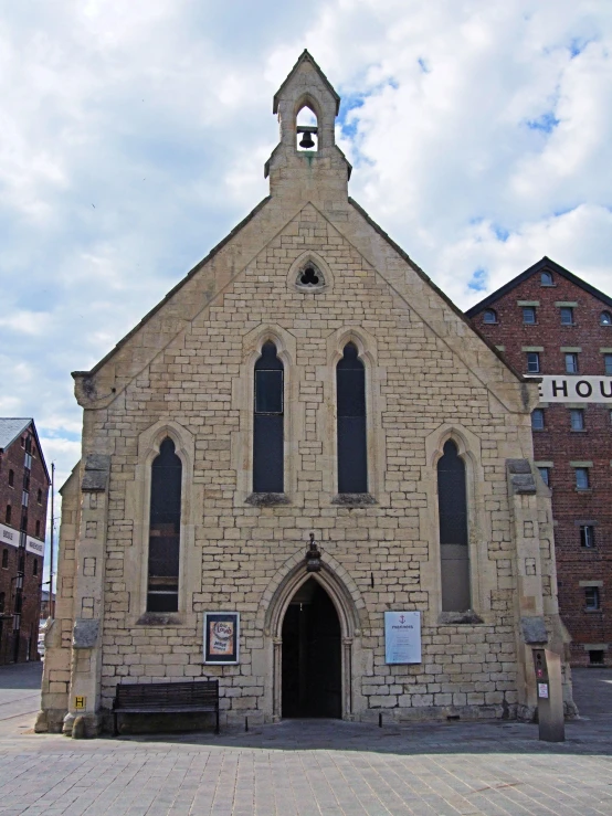 an old church sits in the middle of a city