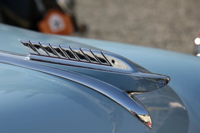 a close up view of a shiny blue car