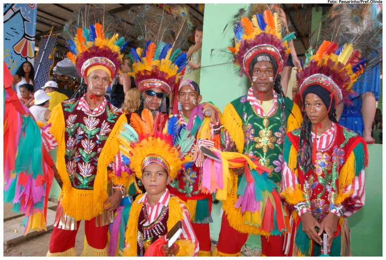 a group of people dressed in colorful costumes