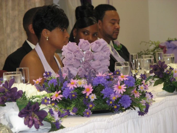 people sit and listen to the speakers at the event