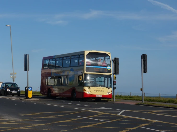 a double decker bus traveling on the highway