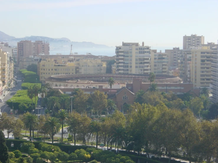 several buildings overlooking a park and street