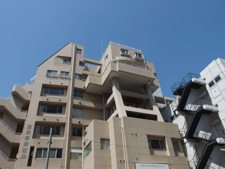 a large building is shown with many windows