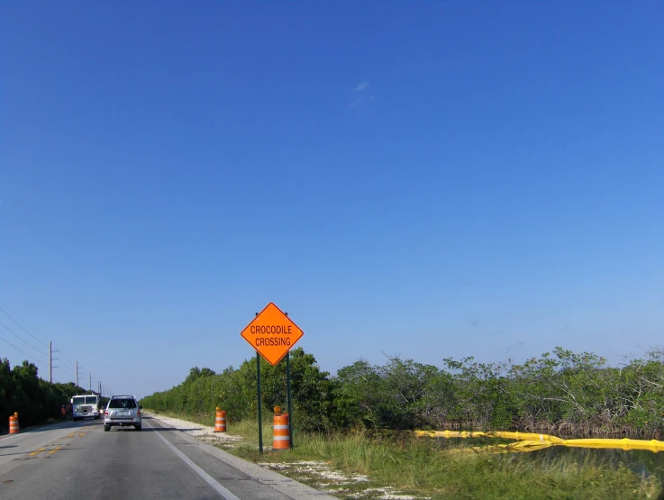 a construction zone is being developed and has a road with signs and road cones