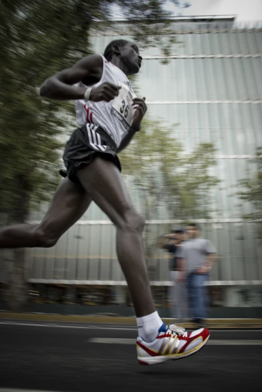 a man that is running on the road