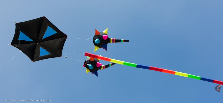 a couple of kites that are in the air