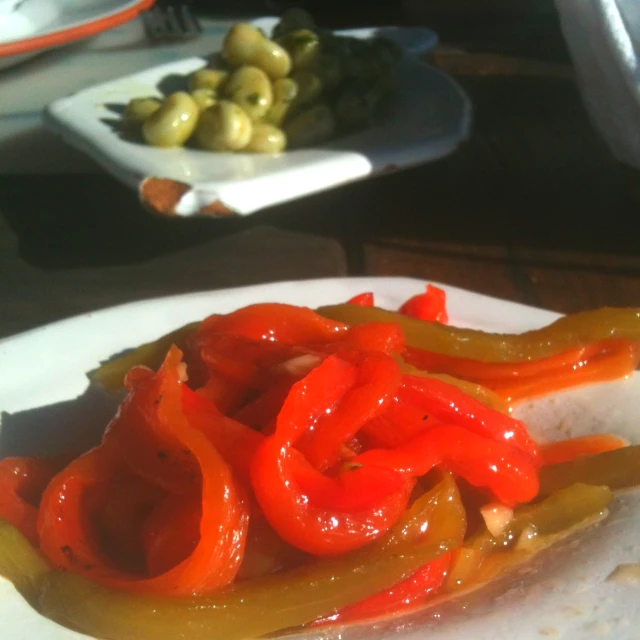 peppers that are on top of a plate