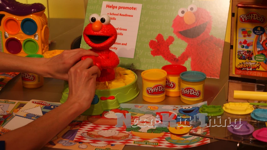 a young child is playing with the toys