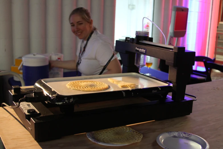 an image of a woman making some food