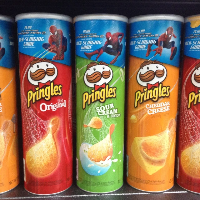 a row of three different flavors of pringles