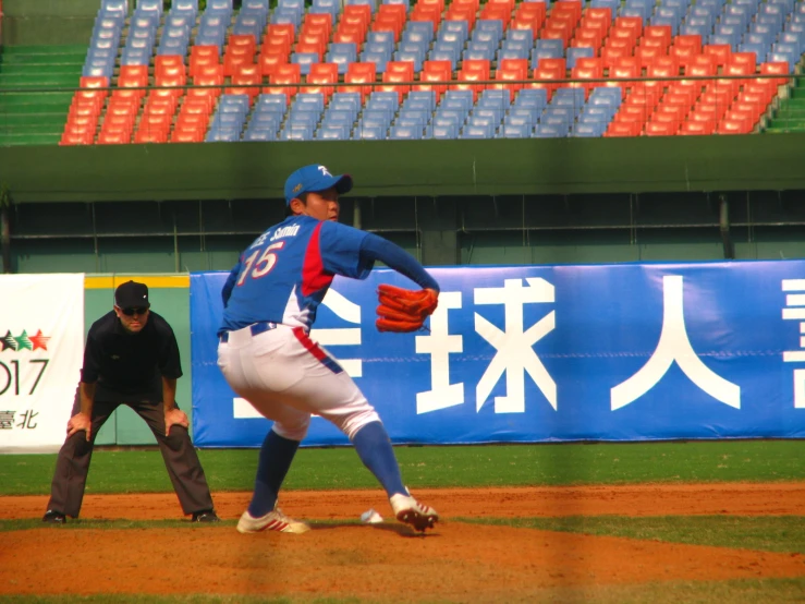 a baseball player standing on top of a field