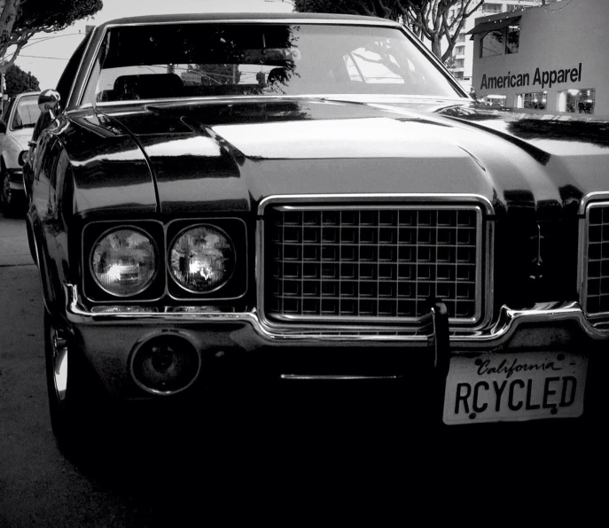 a black and white po of a car that is parked